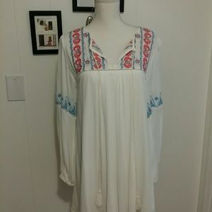 BOHO flowy white dress with beautiful embroidery.